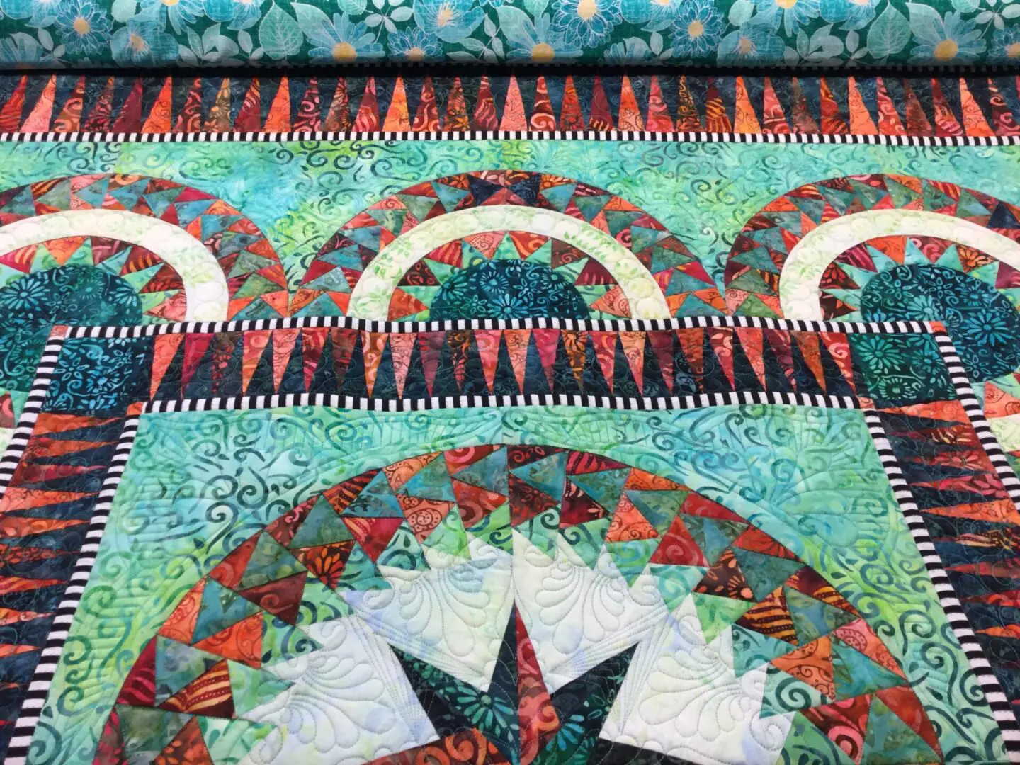 A close up of the quilt with a star on it