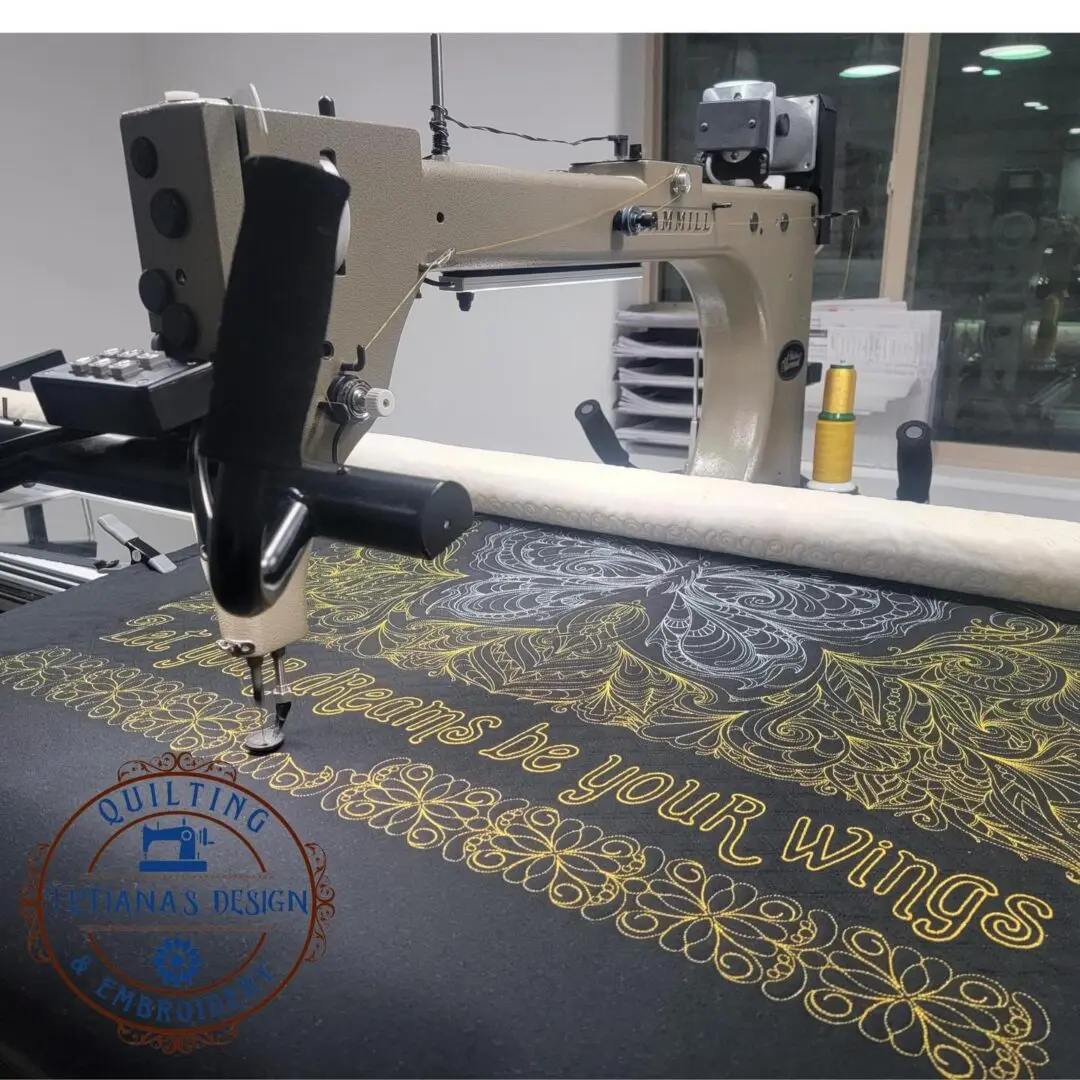 A machine is cutting fabric in the process of being made.