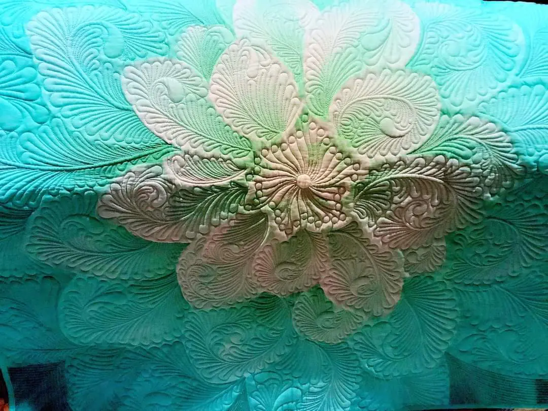 A close up of the flower on the ceiling