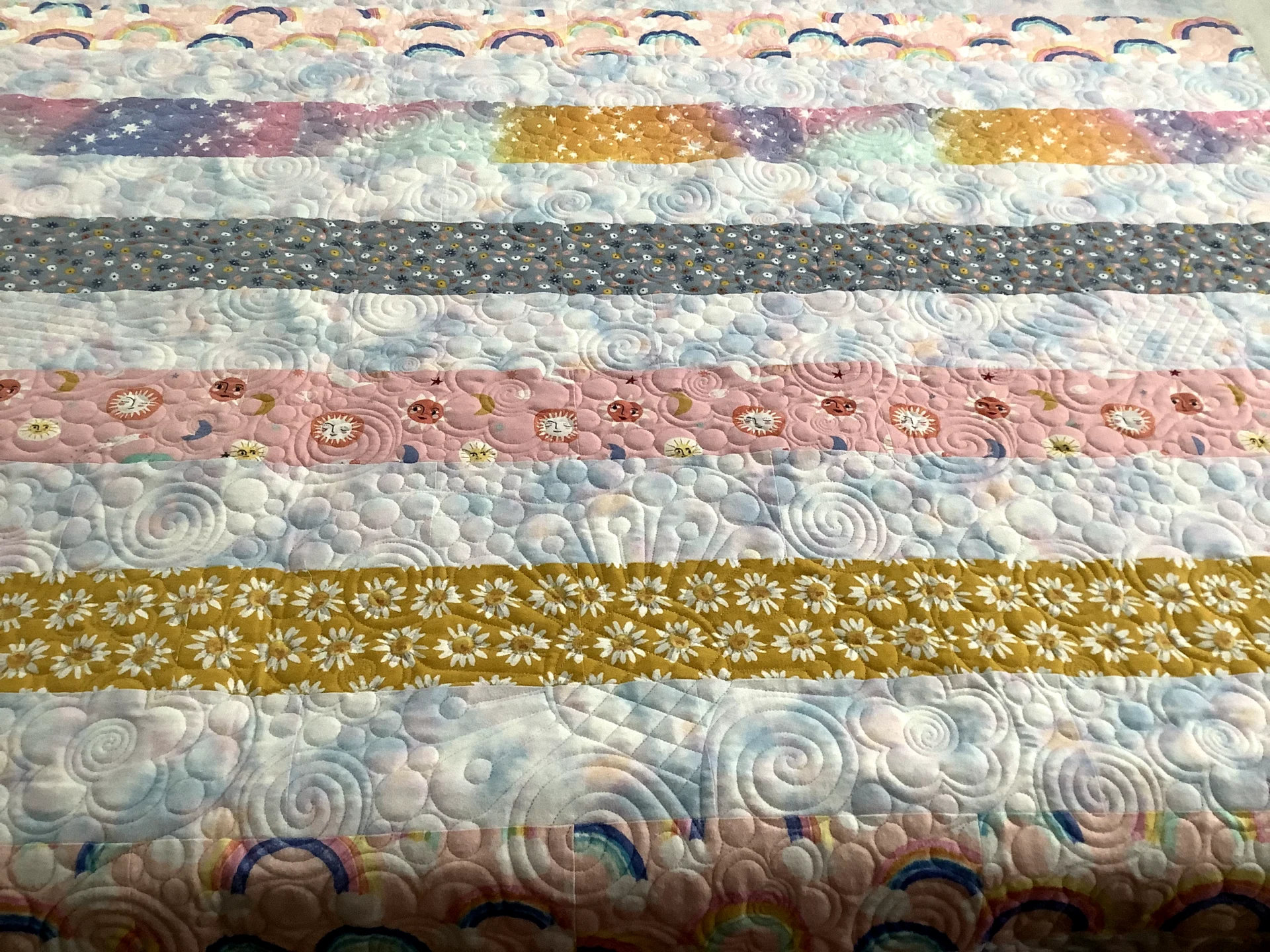 A close up of the strip quilt