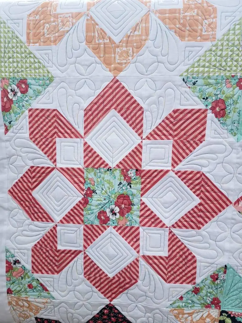 A close up of the quilt pattern