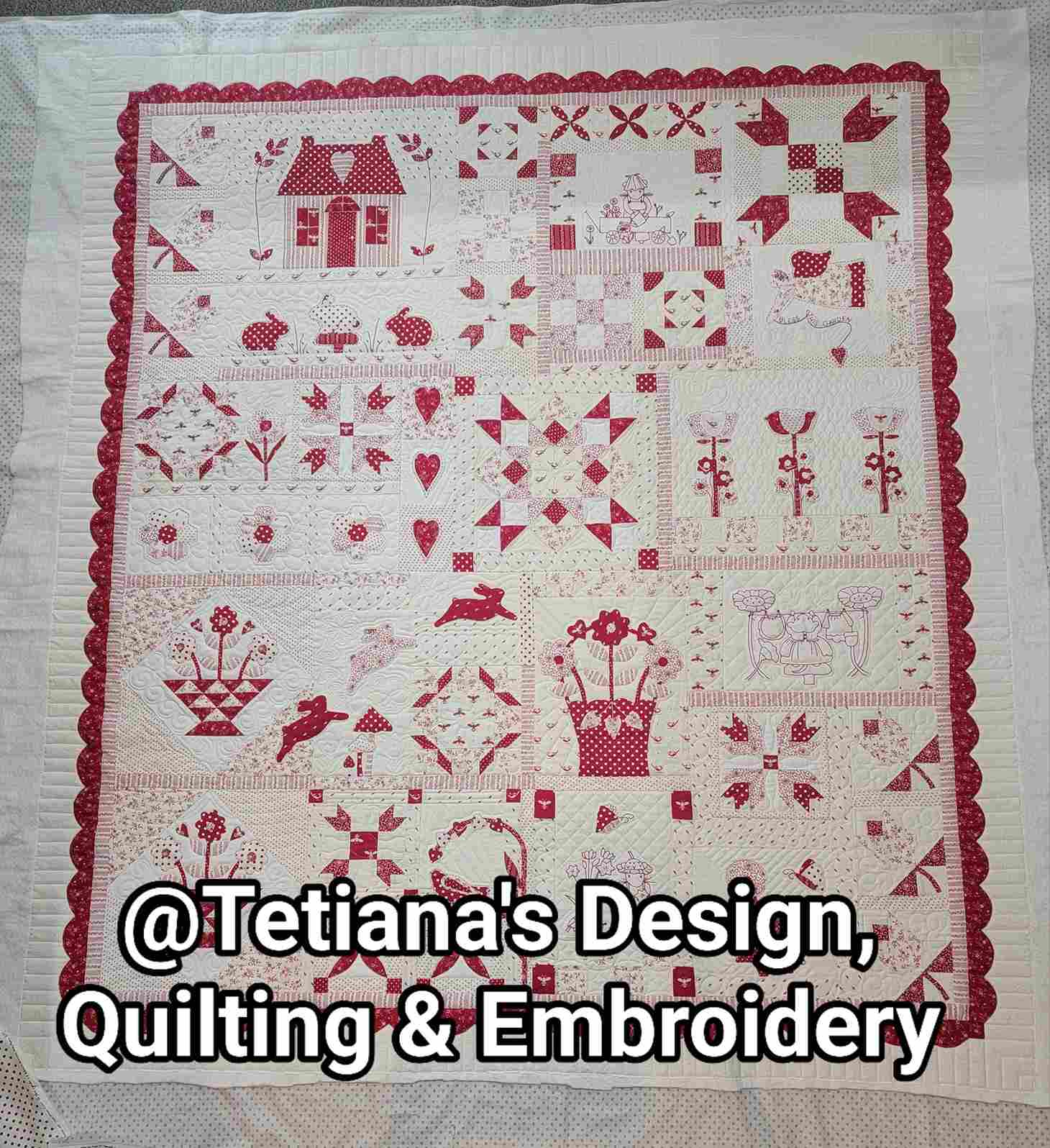 A red and white quilt with many designs