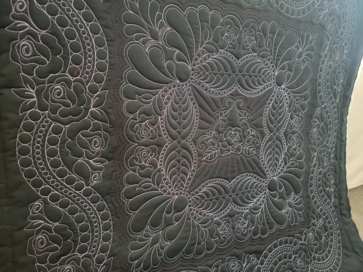 A close up of the intricate design on this quilt