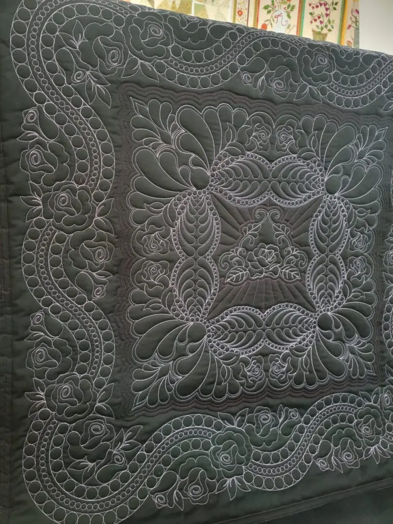 A close up of the intricate design on this quilt