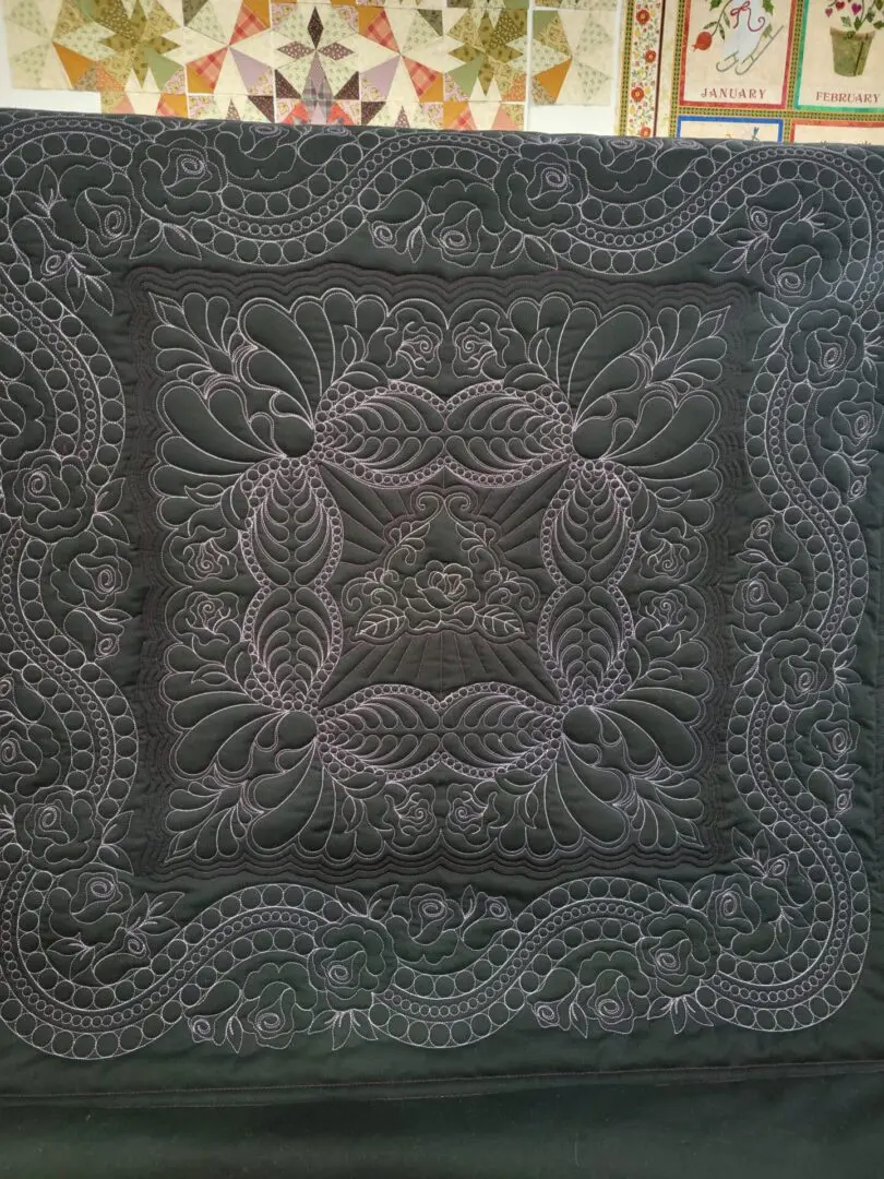 A close up of the intricate design on this quilt